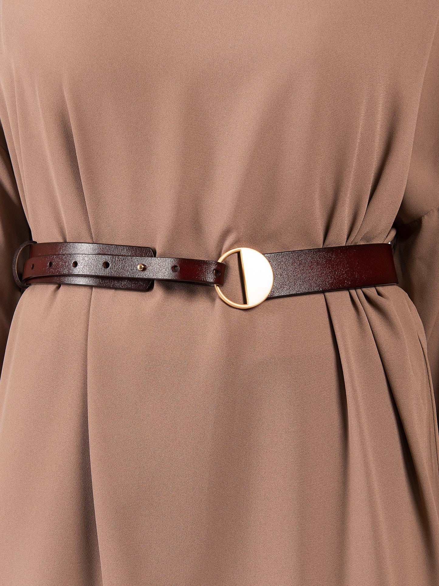 Circular Metallic Logo Belt